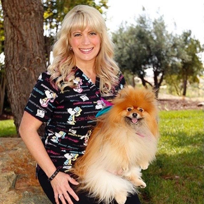 tracy-and-dog A Pomeranian wearing a tiara